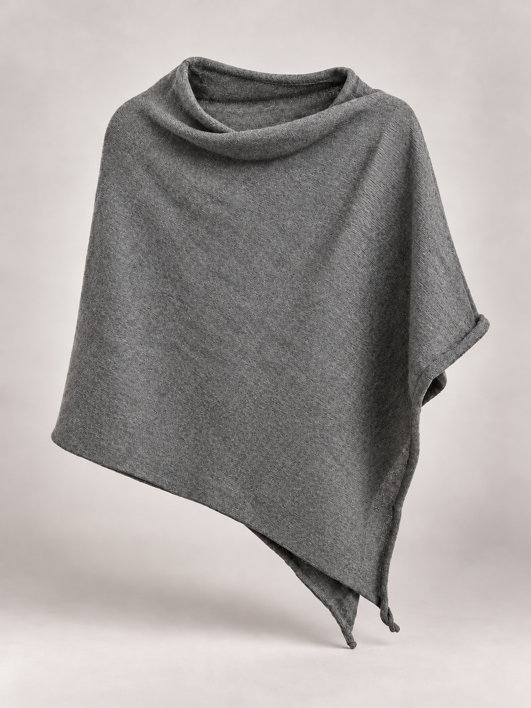 A heather gray cowl neck wrap or poncho draped on a neutral light gray background.