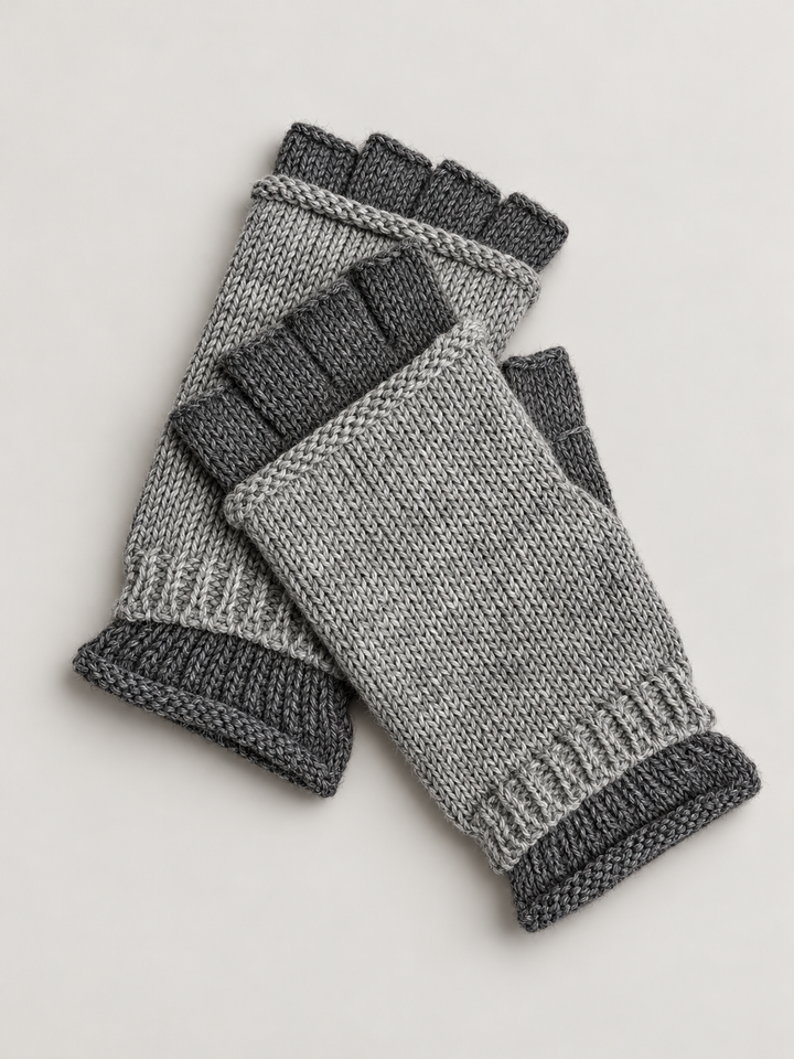 A pair of fingerless knit gloves in heather gray with dark gray ribbed cuffs and finger sections, displayed on a light gray background.